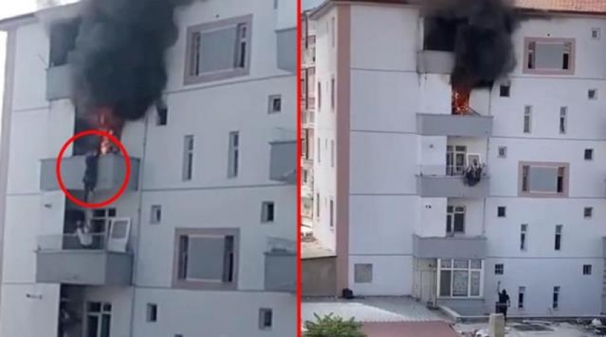Alevlerin içinde kalan binadan atlayan kadını komşusu havada yakaladı!