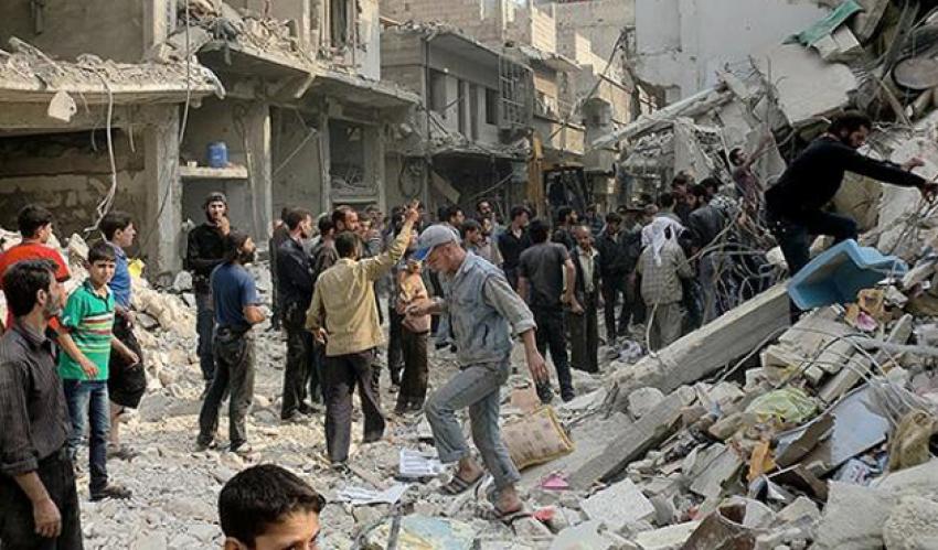 Suriye'de varil bombalı saldırı: 13 ölü