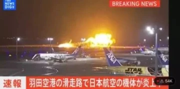 Tokyo'daki Haneda Havalimanında pistteki bir uçakta yangın çıktı